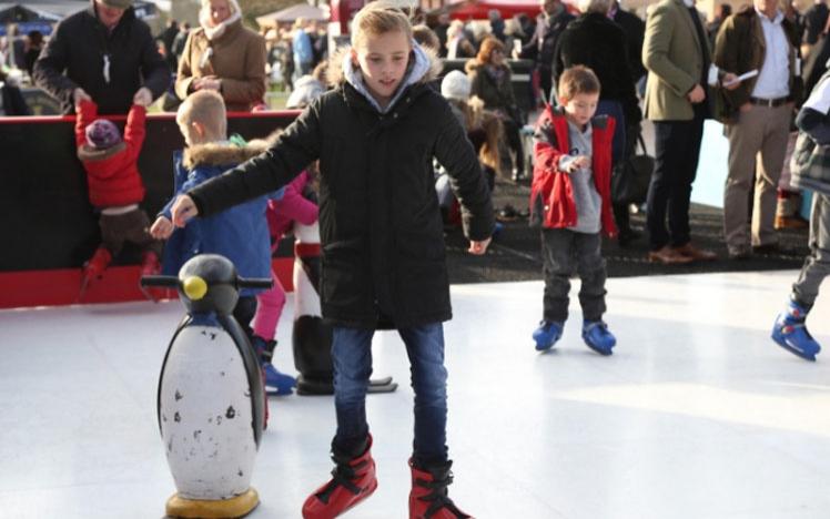 People ice skating.