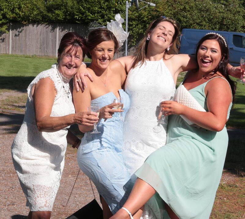 A group of ladies pulling a silly pose for a photo at Fontwell Races
