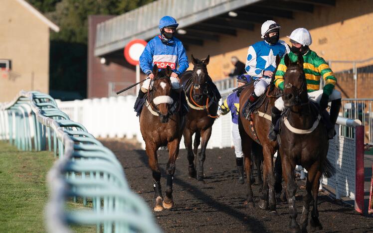 Jockeys at Fontwell Park Racecourse.