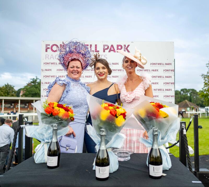 Ladies Day at Fontwell Park. Picture depicts three women in the Style Awards Final receiving prizes for best dressed.