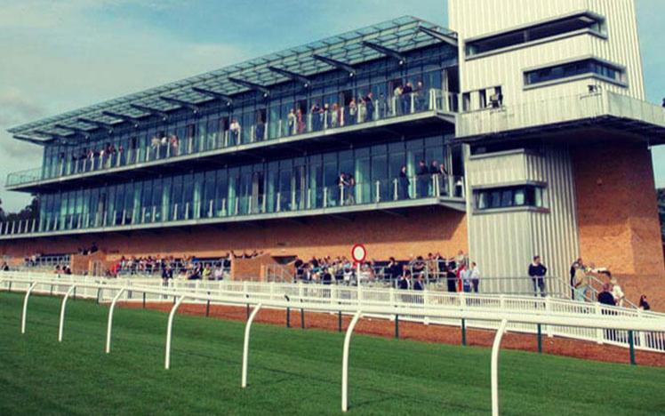 View of the main grandstand at Fontwell Park Racecourse.